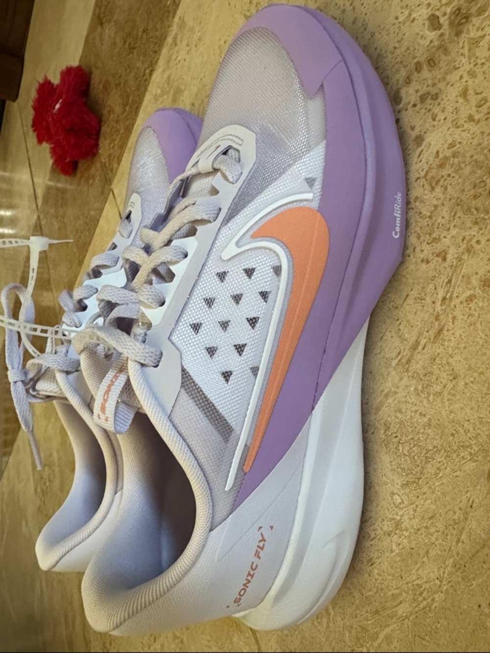 Brand new size 7 Nike Women's Lavender and Peach Shoes